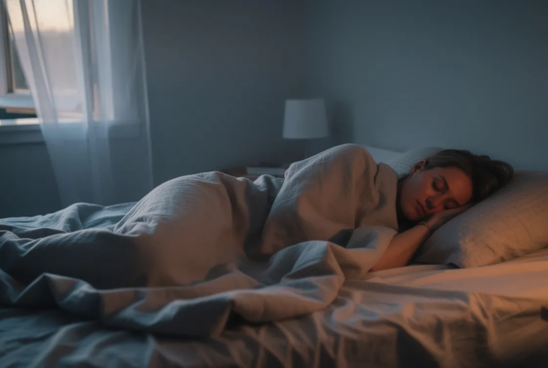 Sleeping woman in a beige bed
